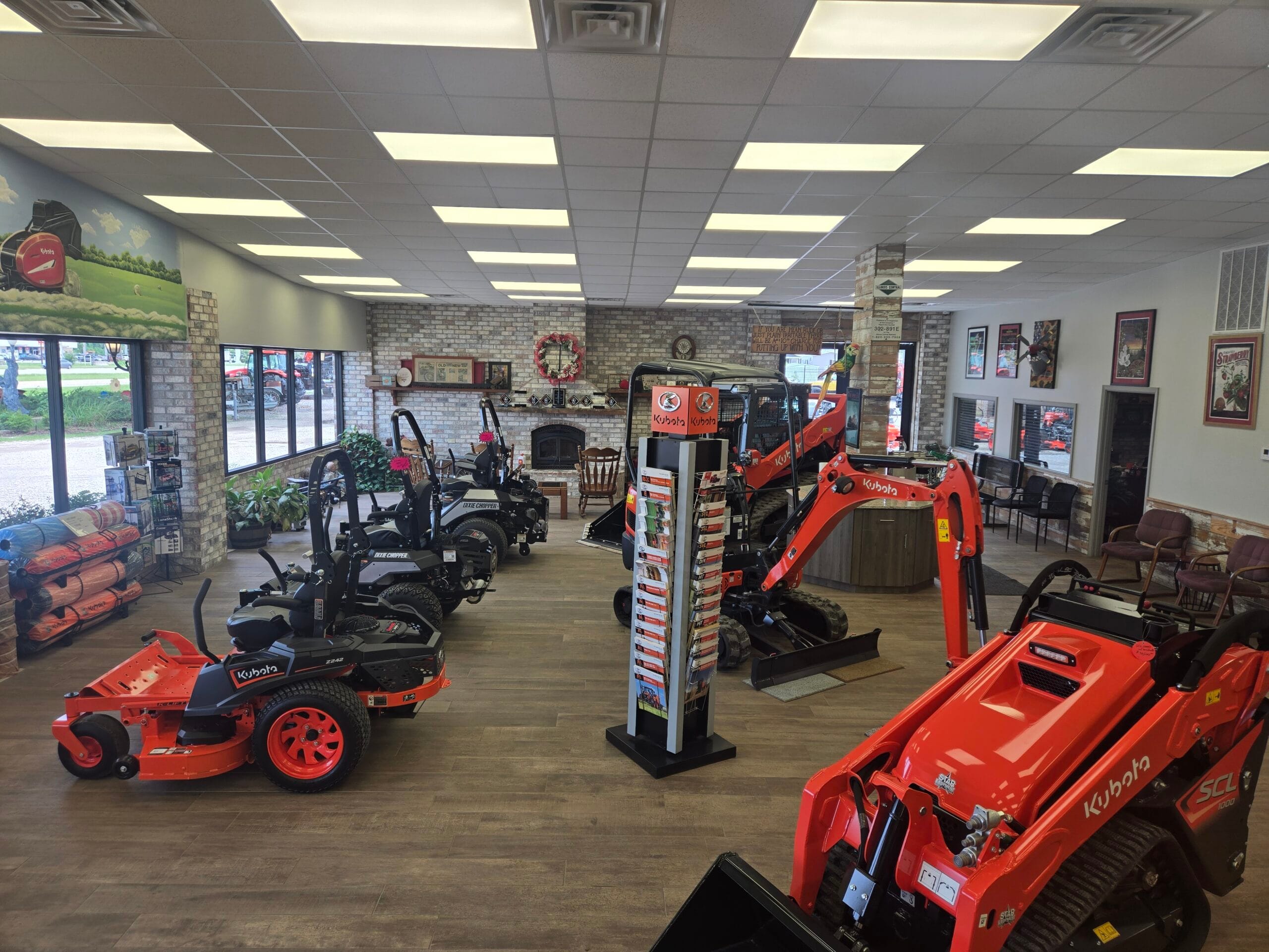 Display of main customer space, showing off lawn mowers, excavators, etc.